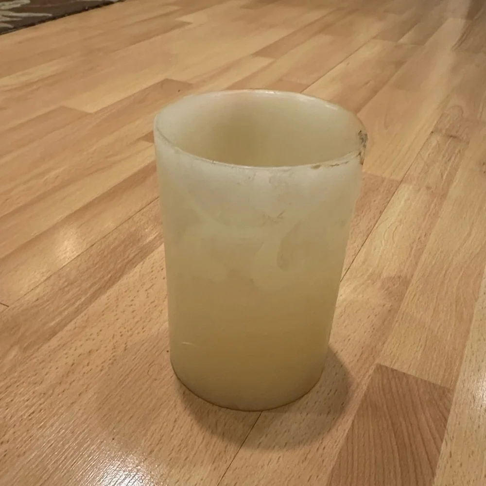Large white pier one pillar candle